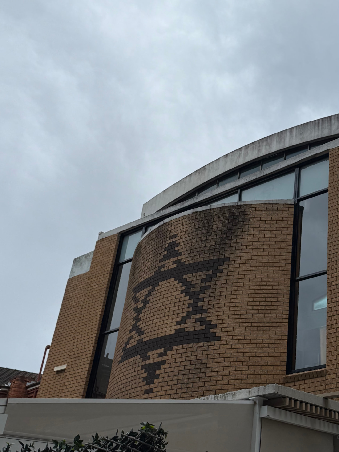 Curved facade commercial glazing by TK Aluminium